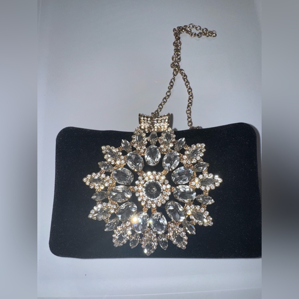 Evening bag with gold, long chain